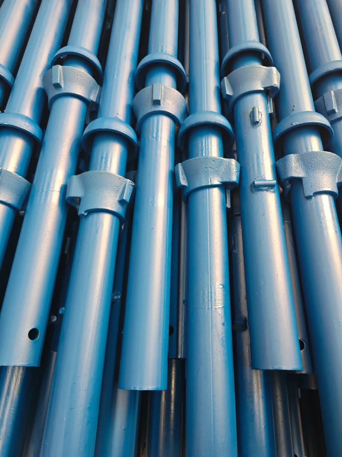 Close-up of cuplock standards with cups