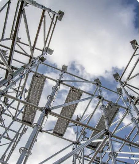 Scaffolding platforms photographed from below against the sky