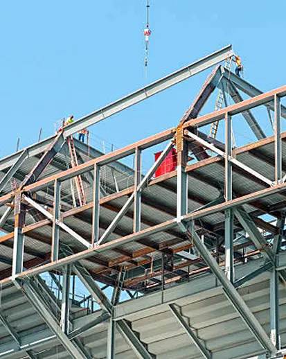 Steel structure being erected with a crane