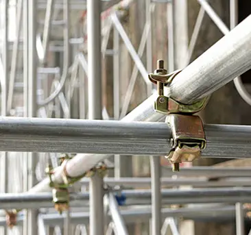Close-up of a scaffold tube coupler connection