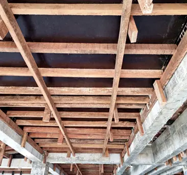 Timber formwork beams supporting a concrete soffit