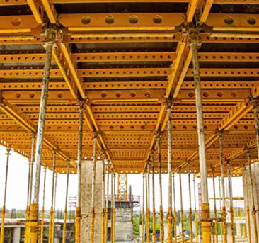 Adjustable steel props under a formwork deck